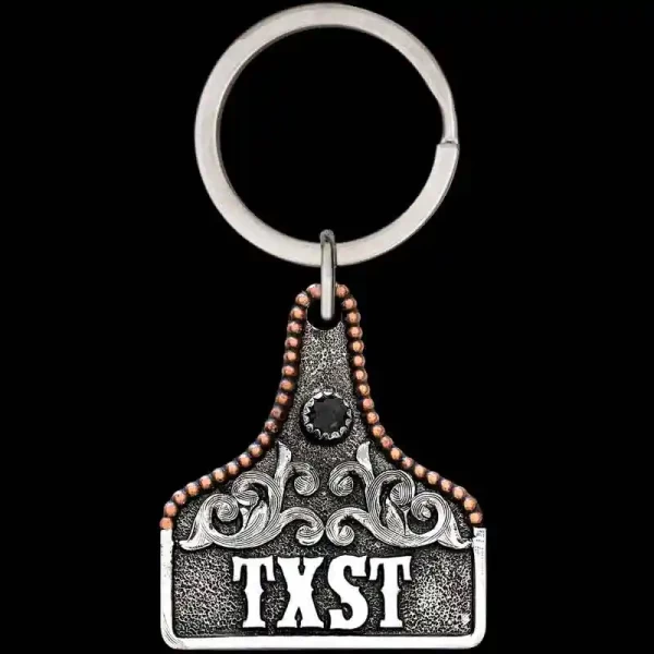 "Our Pure Country Custom Keychain is crafted on a matte German Silver base, finished with our signature antique detailing and Copper bead edge. Customize this keychain by selecting your desired stone color and adding personalized lettering, custom lo